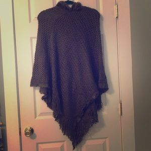 Fringed grey knit poncho